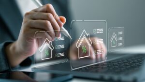 Businessperson using digital to manage housing loan interest rates. Mortgage calculation, real estate finance, online loan application and financial technology concept. Paperless lending system.