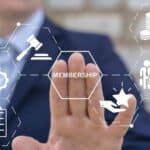 Concept of membership. Business company join us. Business person using virtual touch screen presses the word MEMBERSHIP.